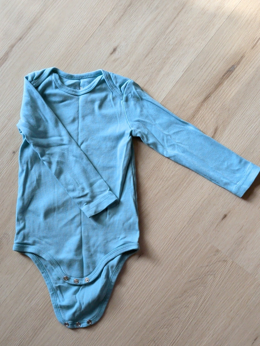 Primary Long-Sleeve Baby Bodysuit in Light Blue